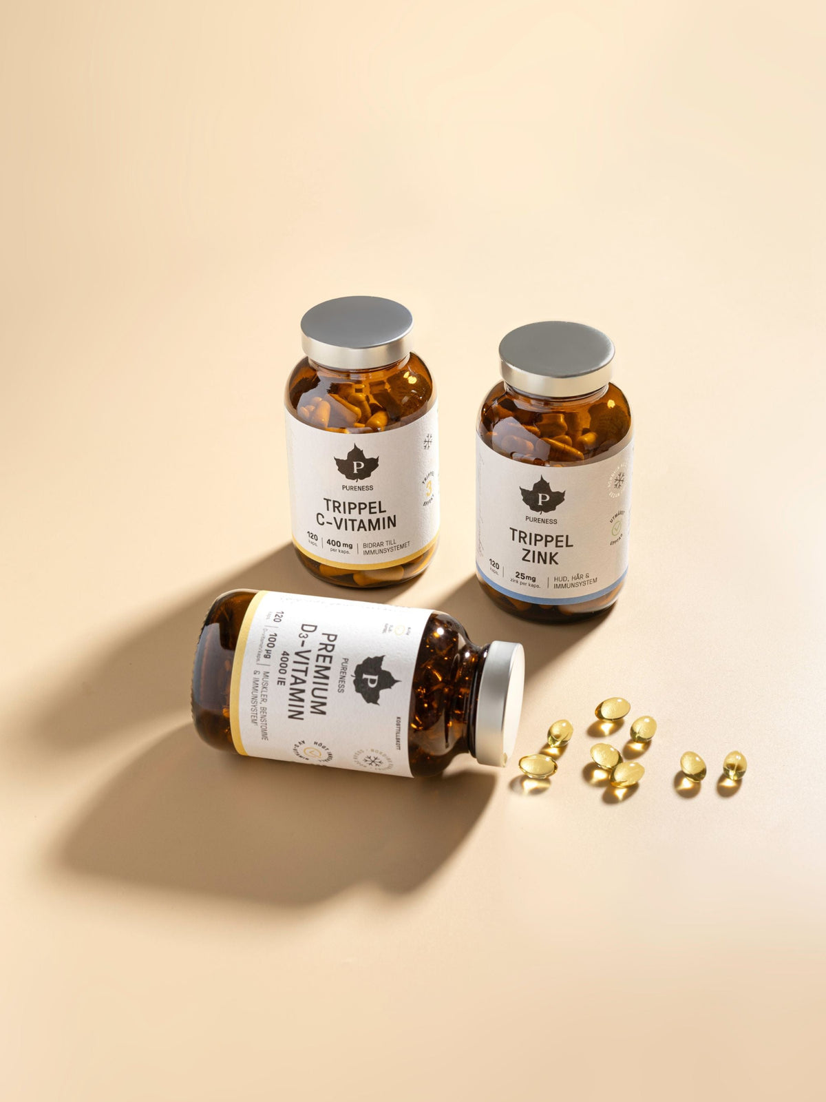 Pureness trippel c-vitamin, trippel zink, premium d-vitamin med en beige bakgrund